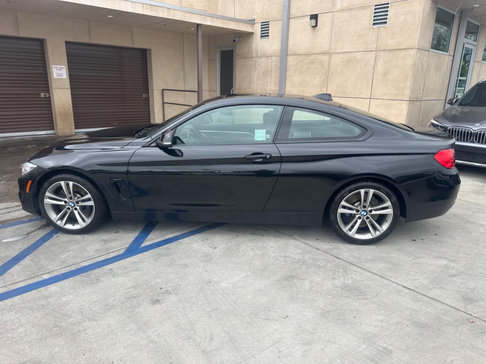 2015 Black BMW 4-Series 435i coupe (WBA3R1C55FK) with an 3.0L V6 DOHC 24V engine, 8-Speed Automatic transmission, located at 30 S. Berkeley Avenue, Pasadena, CA, 91107, (626) 248-7567, 34.145447, -118.109398 - Photo #1